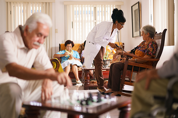 doctor visiting an aged patient